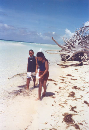 Casuarina-cleaning-at-Lucayan-National-Park.jpeg.jpg