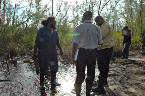 Environment_Minister_Dorsett_speaks_to_DEHS_Inspector_and_Emergency_Worker.jpg