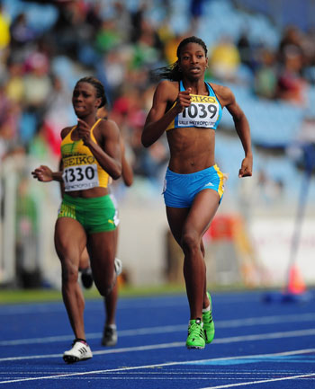 Gold-medal-winner-Shaunae-Miller-of-the-Bahamas-_r_-in-action-on-her-way-to-winning-the-Girls-400-metres-race-during-day-three-.jpg