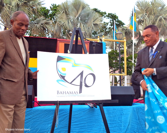 PM-Christie-and-Charles-Carter-unveil-40th-celebrations-logo.jpg