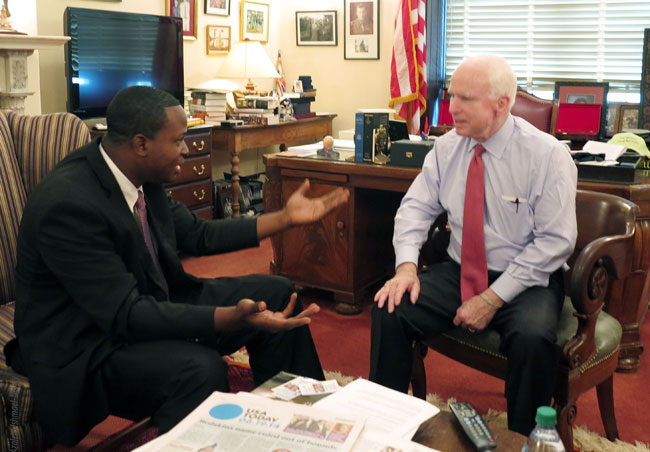Photo-1-Jamaal-Rolle-and-Senator-John-McCain-discuss-art-project-in-Washington-DC-June-2014-photo-by-Azaleta.jpg