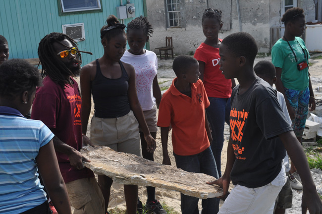 Indaba-Stewards-transporating-Cat-Island-Field-Stones--in-prepartion-for-the-Cat-Island-Kitchen-Restoration-Project.jpg