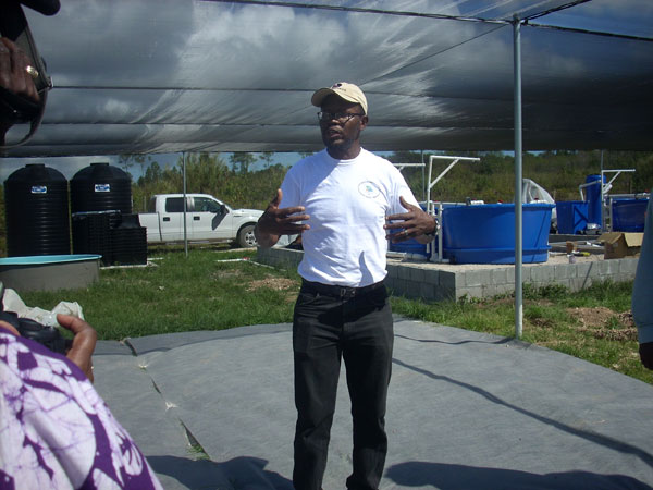 Dr-Deleveaux-addresses-the-media-during-a-recent-tour-led-by-Minister-of-Agriculture-Alfred-Gray.jpg
