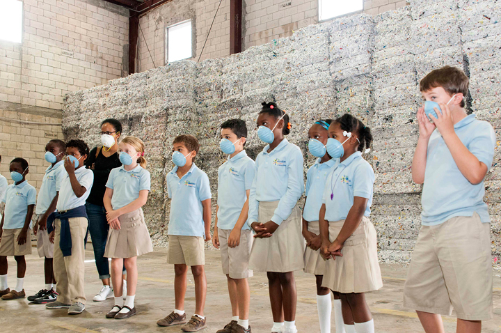 Photo-6-Meridian_s-recycling-tour-at-Sunryse_-students-near-wall-of-shredded-paper-.jpg