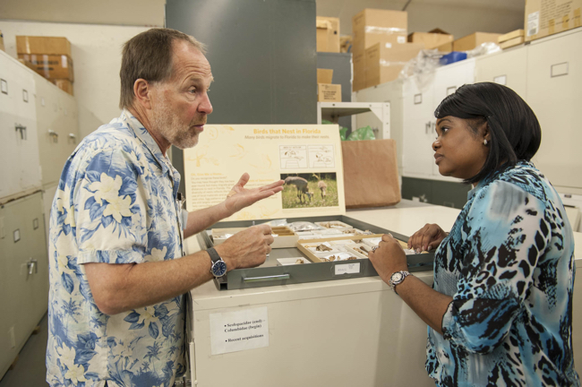 Photo_3-_Dr._Dave_Steadman_of_Florida_Museum_explaining_ornithology_collection_to_AMMC_s_Miller.jpg