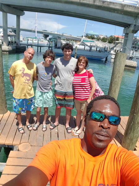 Photo_3-_Passengers_pose_for_a_selfie_before_heading_out_on_the_sea_with_My_Water_Sports_CEO_Gerran_Nottage.jpg