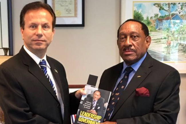 Richard_Demeriette_presents_new_book_to_Ambassador_Joudi.jpg