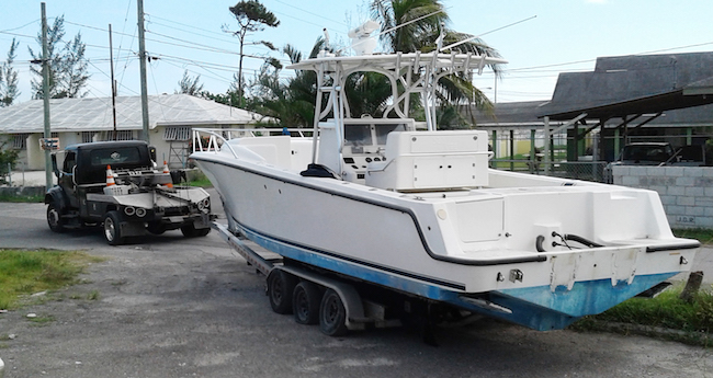 SeaVee_stolen_boat_being_recovered_Nassau_Village_Dec_3.jpg