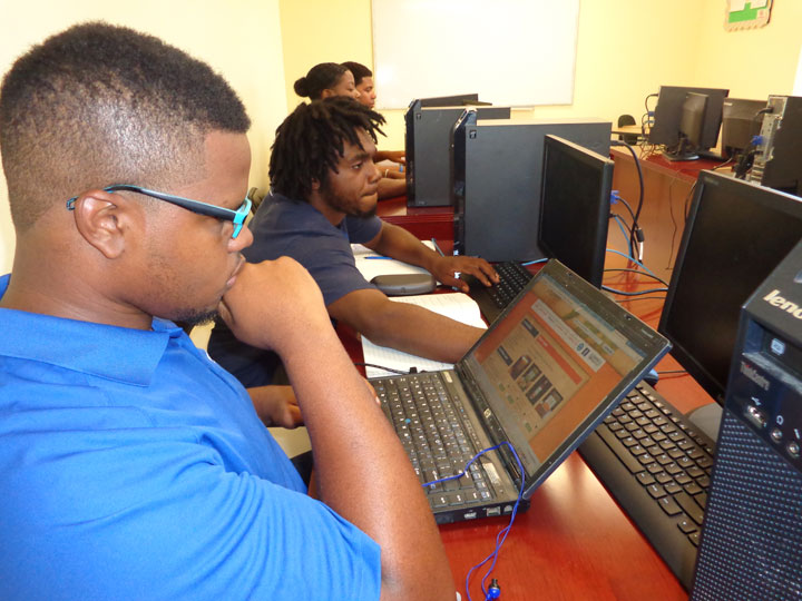 Whether-on-their-laptops-or-BAMSI_s-computer-lab_-agriculture-students-Shadrick-Farrington-and-Steven-Rolle-_in-glasses_-can-access-EBSCO-and-the-newly-acquired-distance-learning-platform-.jpg