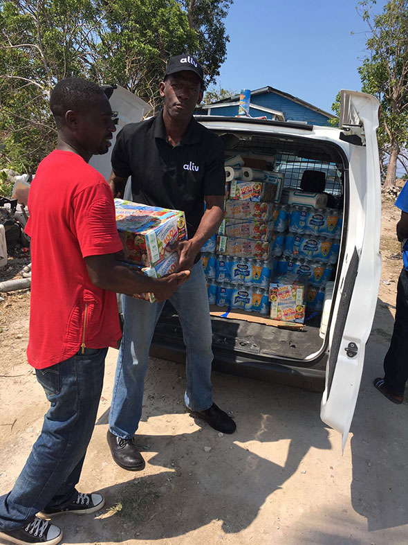 Aliv-offloads-goods-to-be-given-to-residents-of-Haitian-Shanty-Town-.jpg
