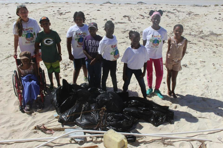EARTHCARE_Eco_Kids_with_marine____debris_collected_for_Earth_Day_at_Williams_Town_Beach.jpg