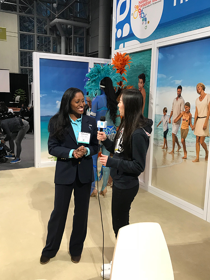 Mikala_Moss_Area_Mngr_NY_being_interviewed_at_NY_Times_Travel_Show.jpg