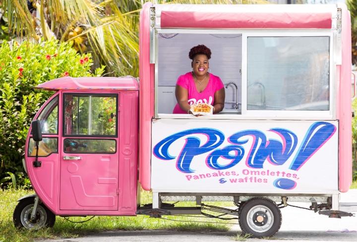 Photo_2-_Xavia_Rolle_serving_customers_at_POW__Food_Truck_popup_brunch.jpg