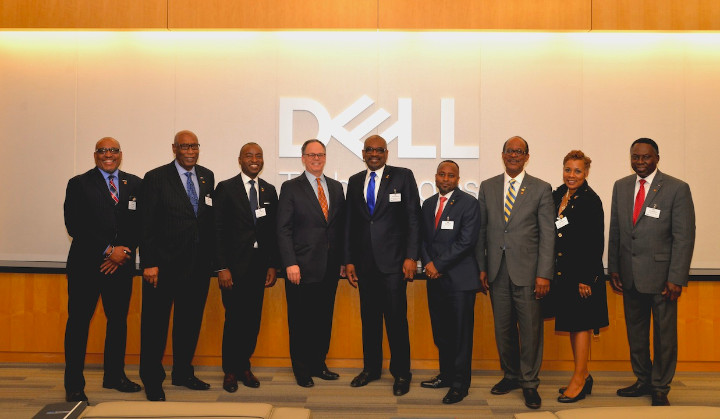 Photo___2_-_Prime_Minister_Minnis___His_Delegation_Takes_A_Group_Photo_In_Front_of_Dell_Logo_With_The_Director_of_Government_Affairs___Public_Policy_John_L._Howard__Jr.jpg