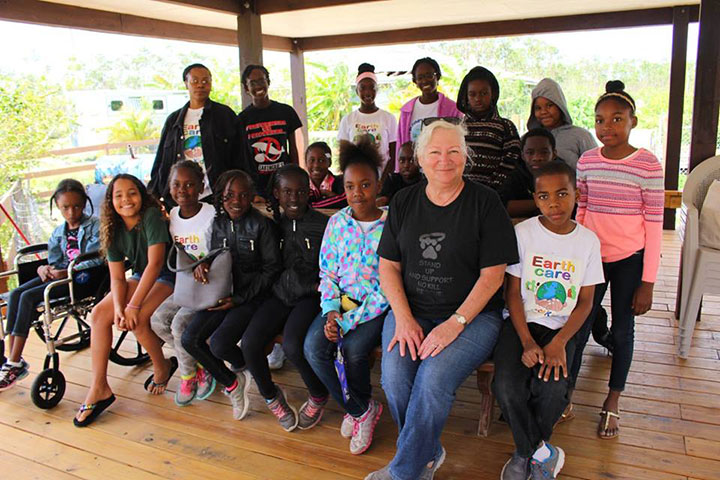 Tip-Burrows_-Humane-Society-of-Grand-Bahama-with-EARTHCARE-Eco-Kids-at-Ol_-Freetown-Farm.jpg