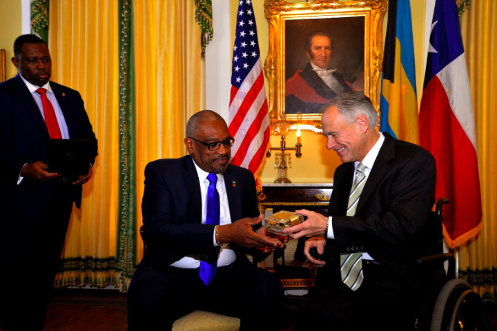 __3_Texas_Governor_Greg_Abbott_Gives_Prime_Minister_Hon_Dr_Hubert_A_Minnis_A_Gold_Texas_Belt_Buckle.jpg