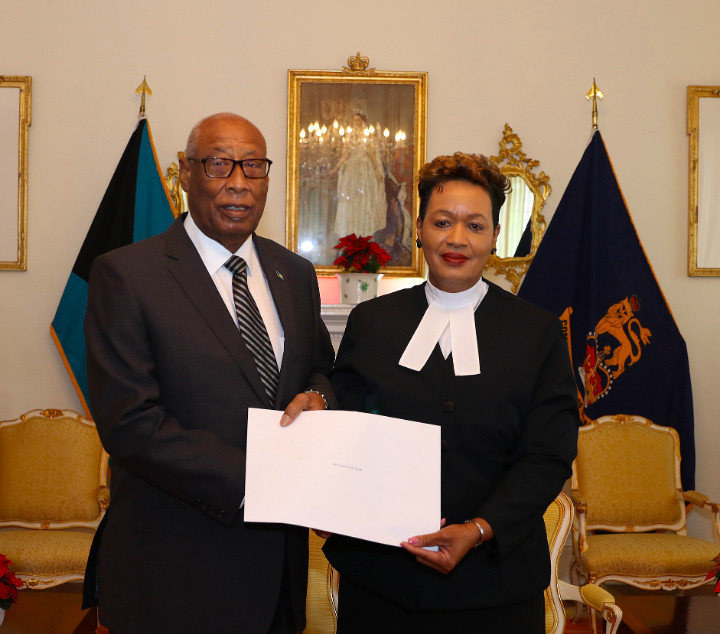 HE_C.A._Smith_and_Acting_Chief_Justice__Hon._Mme._Justice_Vera_Watkins_at_Swearing_In_Ceremony_at_Government_House.jpg
