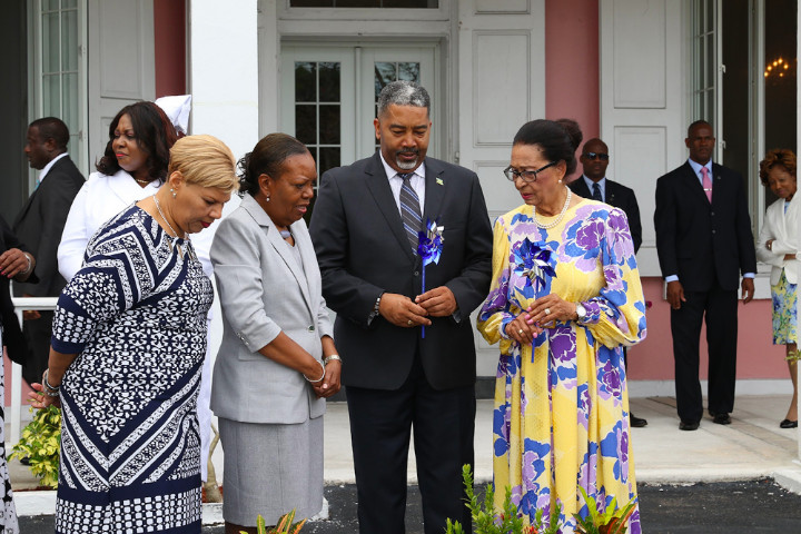 Minister_Campbell_chats_with_Dame_Marguerite__right___PS_Sherrylee_Smith__second_left___and_Social_Services_Dept._Director_Lillian_Quant-Forbes.jpg