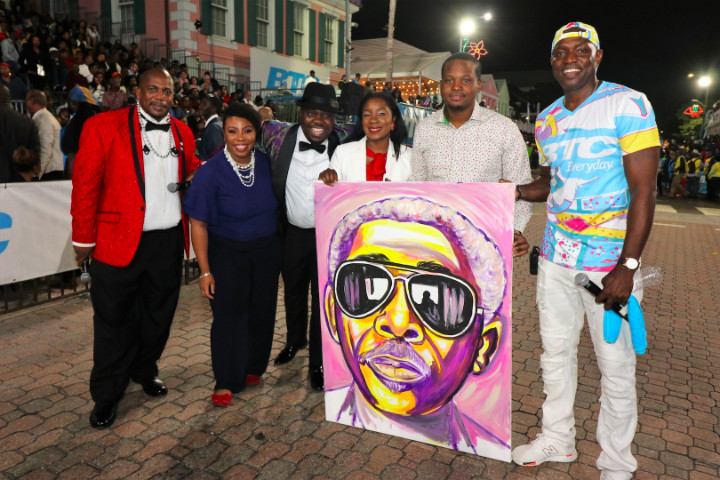 New_Year_s_Day_Junkanoo_-_Minister_Lanisha_Rolle__artist_Jamaal_Rolle__with_Ronnie_Butler_Portrait_1_.jpg