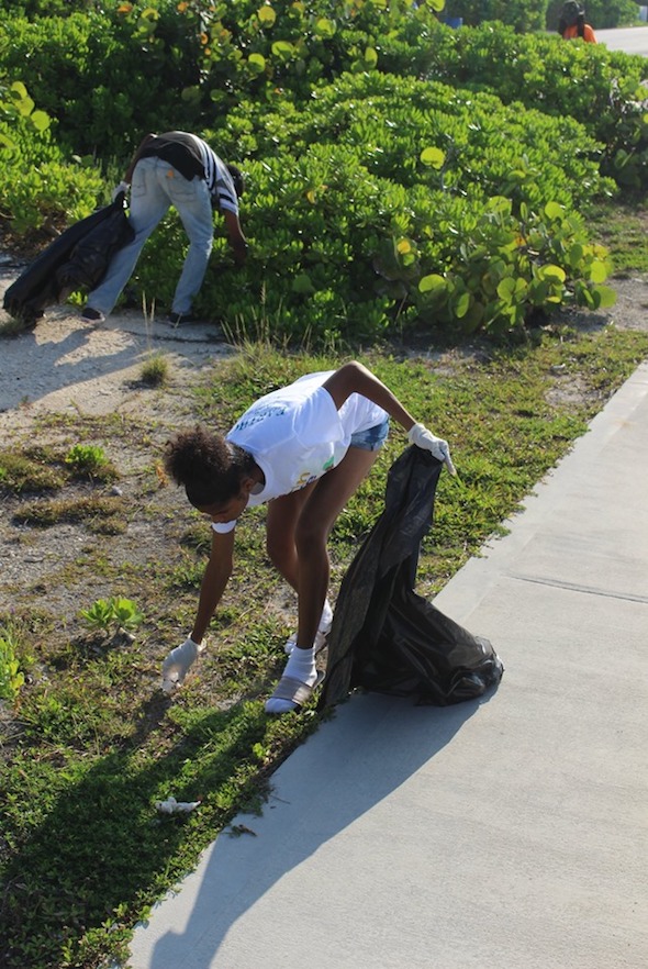 Penelope_Lighbourn__EARTHCARE_Eco__Kid_in_action_cleaning_Williams_Town_Beach_in_honour_of_World_Oceans_Day__2019.jpg