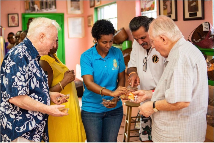 Andrica_Smith_Munroe_with_some_EAT_Bahamas_Food_Tour_guests_at_Mortimers_Candie_Kitchen.jpg