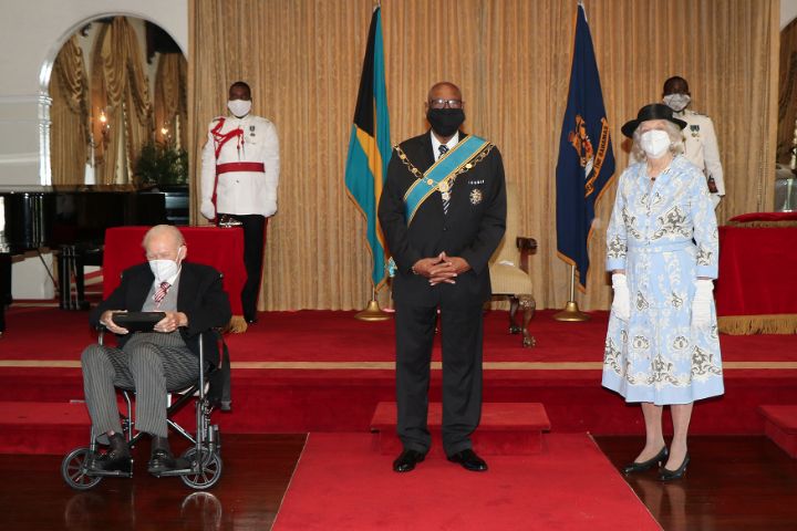 Governor_General_HE_the_Most_Hon._Sir_Cornelius_A._Smith__centre__with_Sir_Godfrey_Kelly_and_Lady_Kelly.jpg