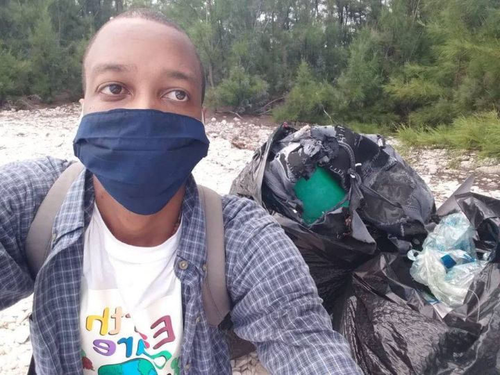 Jahrin_Ellis__EARTHCARE_member_with___________his_ICC_Day_haul_of_Marine_Debris_from_Lovers_Beach.jpg