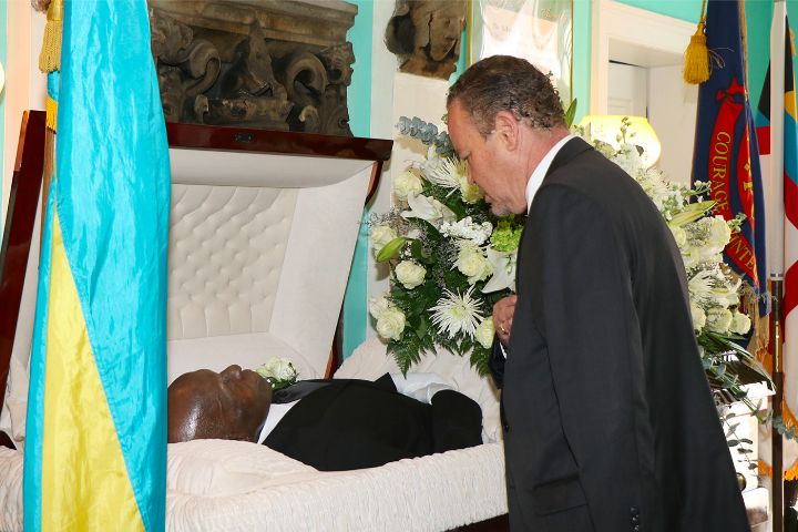 Minister_Carl_Bethel_pays_respects_to_Edward__Bobby__Glinton.jpg