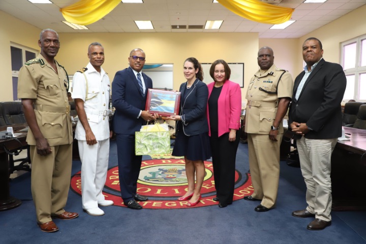 Minister_Dames__3-L__presenting_outgoing_Director_Jamie_Martin__4-R__with_a_plaque_and_gift_along_with__L-R__Commissioner_Murphy_BDOCS__Commodore_Bethel__RBDF___US_Charge_d_Affaires_Stephanie_Bowers__Commissioner_Ferguson__PS_Poitier.jpg