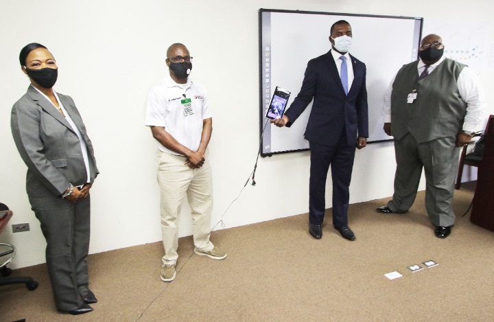 Minister_Johnson_Displays_Facial_Recognition_Thermometer_Camera.jpg