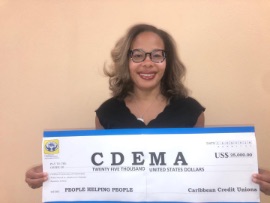 Ms_Denise_Garfield_-_CCCU_with_Cheque_donation_to_CDEMA-2-2.jpg