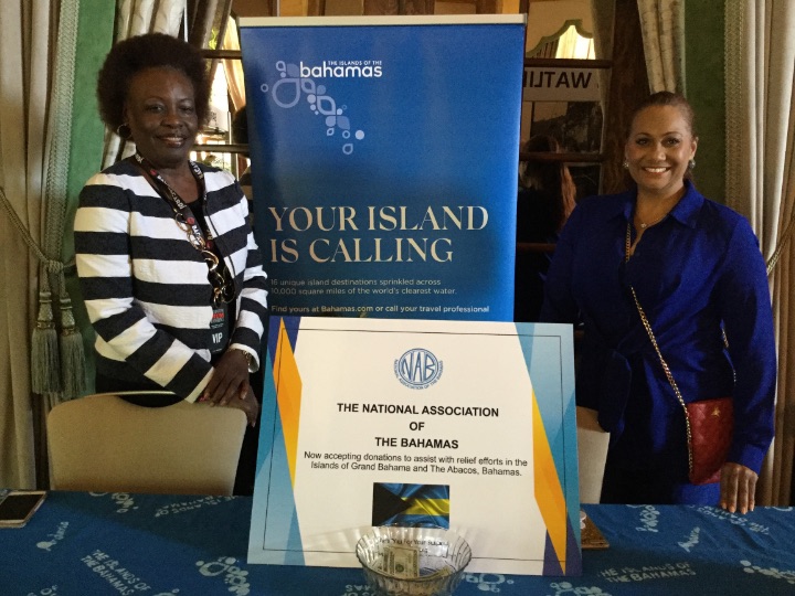 NAB_members_manning_booth_for_Hurricane_Dorian_Relief_Donations_at_International_Rum_Conference_2019_L-R_Dr._Sandra_McDonald_and_Deanna_Christensen.jpg