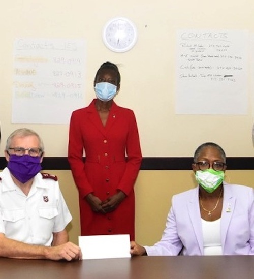 PS_Elise_Delancy_Makes_Cheque_Presentation_on_Behalf_of_Permanent_Secretaries_to_Salvation_Army_s_Major_Clarence_Ingram.jpg