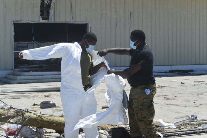 Ph_3_-_RBDF_Marines_putting_on_protective_gears_to_begin_search_and_resuce_efforts_in_Marsh_Harbour_Abaco_following_the_passage_of_Hurricane_Dorian.jpg