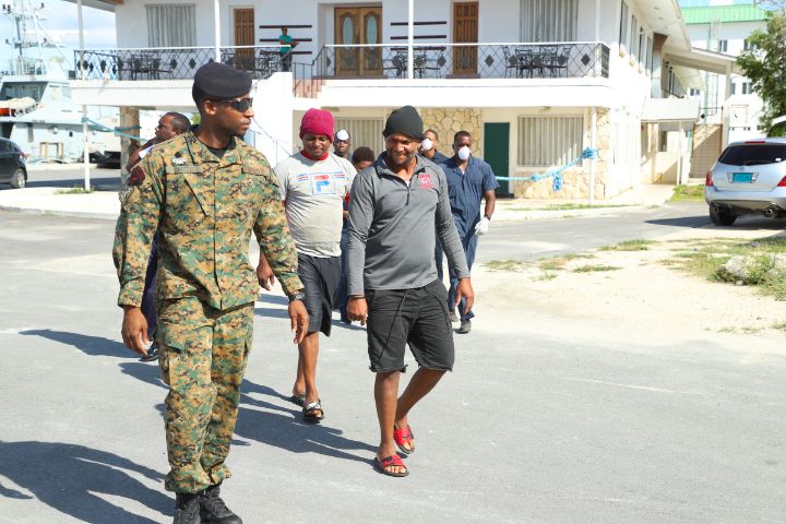 Photo_2_-_RBDF_Marines_Transporting_Apprehended_Dominican_Poachers_Onboard_HMBS_Coral_Harbour_Base_1.jpg