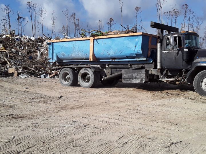 Photo_4-_Workers_at_Spring_City_debris_management_site_process_approximately_185___200_truckloads_of_debris_daily_1_.jpg