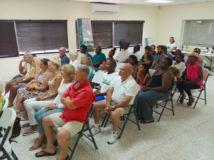 Rapt_audience_members_listen_to______John_Englander_s.jpg