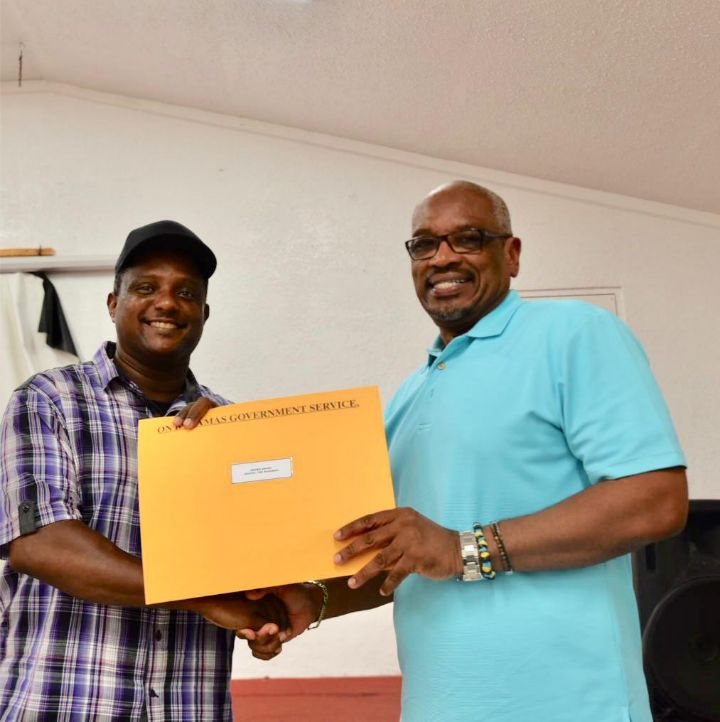 Receiving_Land_Deeds_in_Inagua.jpg