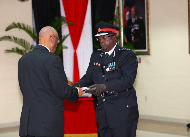 The_Governor_General__left__and_Police_Commissioner-Designate_Paul_Rolle.jpg