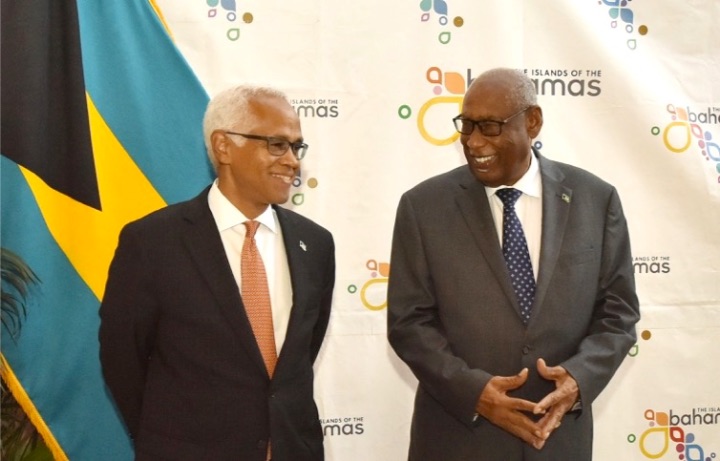 Tourism_Minister_D_Aguilar__left__and_Governor_General_C.A._Smith.jpg