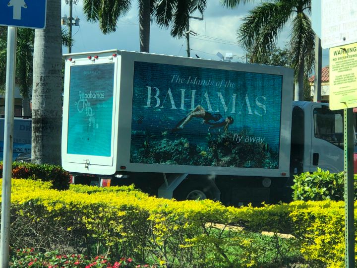 photo_bahamas_branded_bus_n_truck_at_flibs.jpg