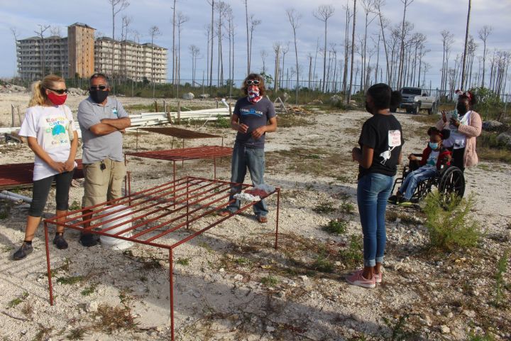 Coral_Vita_Director_of_Restoration_______Operations__Joe_Oliver_explains_the_Coral_Nursery_Tables.jpg