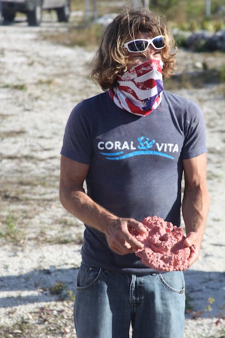 Coral_Vita_Director_of_Restoration_______Operations__Joe_Oliver_holds_a_hand_made_Coral_Nursery_Plate.jpg