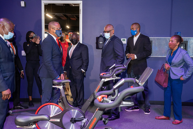 Government_officials_take_a_tour_of_the_state-of-the-art_facility_at_MacFit_West_during_its_recent_grand_opening_ceremony.jpeg