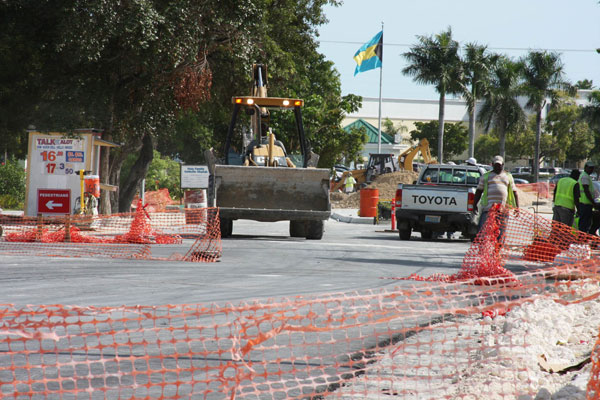 The photo shows the beginning of paving on Robinson Road near to Claridge 